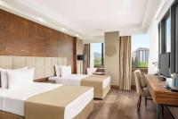 Postel nebo postele na pokoji v ubytování Ramada Plaza by Wyndham Samsun