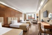 Postel nebo postele na pokoji v ubytování Ramada Plaza by Wyndham Samsun