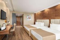 Postel nebo postele na pokoji v ubytování Ramada Plaza by Wyndham Samsun