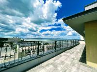 A balcony or terrace at ELLBy Apartman - PENTHOUSE - hostAID