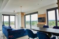 A television and/or entertainment centre at ELLBy Apartman - PENTHOUSE - hostAID