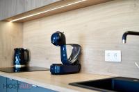 A kitchen or kitchenette at ELLBy Apartman - PENTHOUSE - hostAID