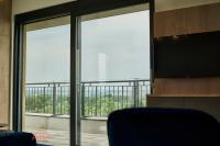 A television and/or entertainment centre at ELLBy Apartman - PENTHOUSE - hostAID