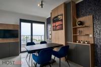 A television and/or entertainment centre at ELLBy Apartman - PENTHOUSE - hostAID