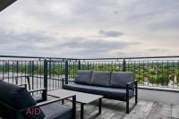 A balcony or terrace at ELLBy Apartman - PENTHOUSE - hostAID