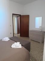 Posteľ alebo postele v izbe v ubytovaní VILLA SALINA MONACI