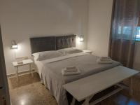 Posteľ alebo postele v izbe v ubytovaní VILLA SALINA MONACI