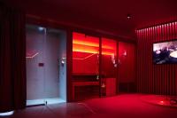 Televízia a/alebo spoločenská miestnosť v ubytovaní Mima Aparthotel Boutique & Spa