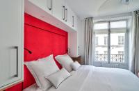 Łóżko lub łóżka w pokoju w obiekcie Sublime appartement au coeur de Paris