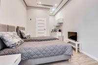 TV a/nebo společenská místnost v ubytování Central Platinum Apartments 27