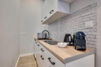 Kuchyň nebo kuchyňský kout v ubytování Central Platinum Apartments 27