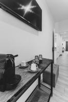 A television and/or entertainment centre at La Posada del Teatro H Boutique Parking Gratis