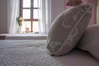 A bed or beds in a room at Luz del Tajo