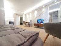 TV a/nebo společenská místnost v ubytování SALOU ,APARTAMENTO CON PISCINA y Wifi