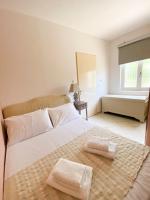Postel nebo postele na pokoji v ubytování Myrtia - Cretan Guest House