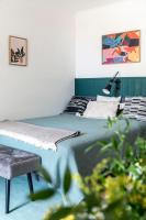 Posteľ alebo postele v izbe v ubytovaní Berky Kúria - Stylish cottage in the Hills of Tolna for 16people