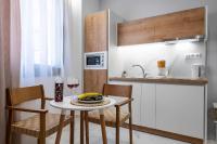 Kuchyňa alebo kuchynka v ubytovaní ammos suites
