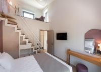 Posteľ alebo postele v izbe v ubytovaní RIZOMATA LUXURY VILLAS