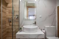 Kúpeľňa v ubytovaní ammos suites