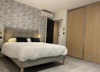 Posteľ alebo postele v izbe v ubytovaní Le Loft de l'hôtel Dieu