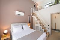 Posteľ alebo postele v izbe v ubytovaní RIZOMATA LUXURY VILLAS