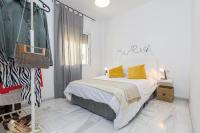 Posteľ alebo postele v izbe v ubytovaní WintowinRentals Coqueto apartamento en el Centro de Málaga