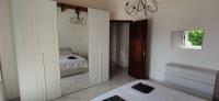 A bed or beds in a room at Villa Fiorita