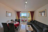 Posedenie v ubytovaní Blue Harmony Sea View Apartment