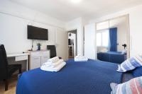 Posteľ alebo postele v izbe v ubytovaní Blue Harmony Sea View Apartment