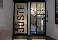 a store front door with a sign that reads exit at Maison Juste in Marseille