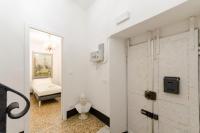 A bed or beds in a room at JOIVY Ideal Flat near Aquarium