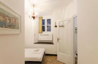 A bed or beds in a room at JOIVY Ideal Flat near Aquarium