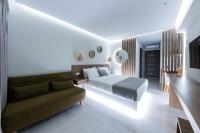 Postel nebo postele na pokoji v ubytování Ammos Luxury Apartments