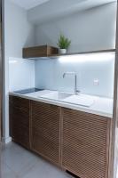 Kuchyň nebo kuchyňský kout v ubytování Ammos Luxury Apartments