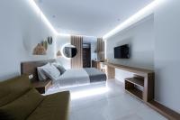 TV a/nebo společenská místnost v ubytování Ammos Luxury Apartments