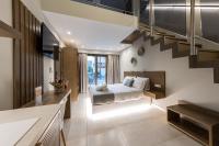 Postel nebo postele na pokoji v ubytování Ammos Luxury Apartments