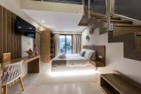 Postel nebo postele na pokoji v ubytování Ammos Luxury Apartments