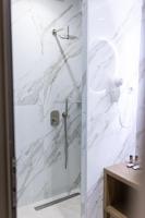 Koupelna v ubytování Ammos Luxury Apartments