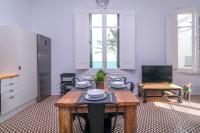 Televízia a/alebo spoločenská miestnosť v ubytovaní 1840 Apartments Sitges by Suma Hotels