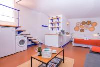Kuchyňa alebo kuchynka v ubytovaní 1840 Apartments Sitges by Suma Hotels