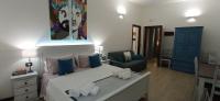A bed or beds in a room at Il Rifugio Del Pirata