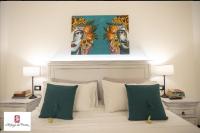 A bed or beds in a room at Il Rifugio Del Pirata