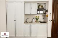 A kitchen or kitchenette at Il Rifugio Del Pirata