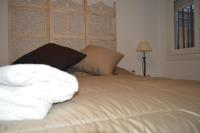 Posteľ alebo postele v izbe v ubytovaní ALCAZAR VIEJO SUITE Tourist Córdoba