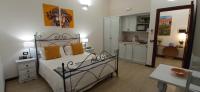 A bed or beds in a room at Il Rifugio Del Pirata