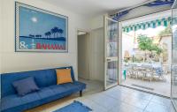 A seating area at Cozy Apartment In Marina Di Ragusa