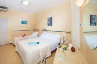 Posteľ alebo postele v izbe v ubytovaní Hotel Condor