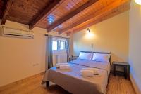 Postel nebo postele na pokoji v ubytování Corfu Summer Maisonette