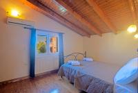Postel nebo postele na pokoji v ubytování Corfu Summer Maisonette