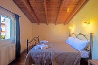 Postel nebo postele na pokoji v ubytování Corfu Summer Maisonette